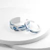 Exquisite Blue Topaz Sterling Silver Couple Ring featuring a vibrant blue topaz gemstone set in a polished sterling silver band, symbolizing timeless love and commitment, with an adjustable size for a perfect fit.